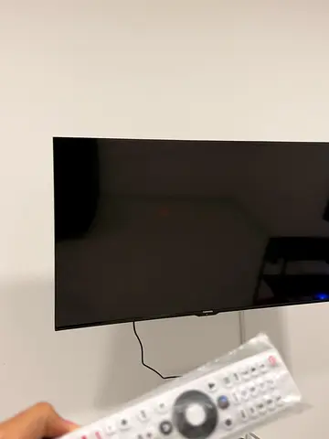 Sleek 55-inch LED TV with Remote Control