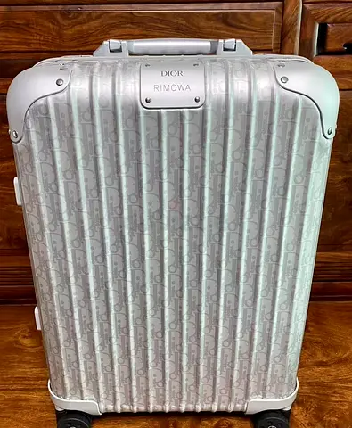 Dior X Rimowa silver suitcase