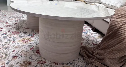 Modern Round Coffee Table with Elegant Finish