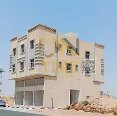 New two-story building in an investment location in Ajman Aliya