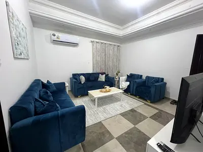Cozy Blue Fabric Sofa Set with Coffee Table, two side tables, tv unit, curtains and Carpet