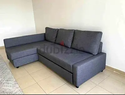 Excellent condition IKEA brand L shape sofa bed with storage