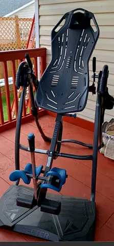 Teeter FitSpine LX9 Inversion Table, Deluxe Easy Reach Ankle Lock, Decompression Surface for Back Pa