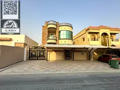 For rent in Al Yasmin, Ajman, a villa consisting of 5 master bedrooms, a majlis, a living room, and