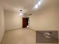 For sale: Two-bedroom apartment with parking in Sharjah / Al Majaz