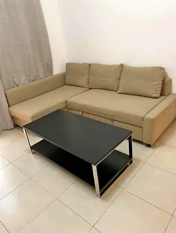 Corner sofa-bed with storage