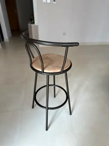 Two rotating bar stools for sale