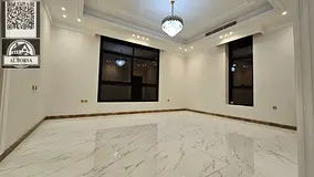 For rent in Al Yasmin, a second-to-last villa with five master bedrooms, a majlis, a living room, a