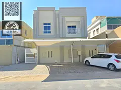 For rent in Al Zahia area, a two-story villa with 5 master bedrooms, a living room, a majlis, a kitc