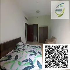 2bed rooms and a hall big size for sale in city towers ajman with two bathrooms and a big kitchen an