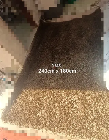 Soft and Cozy Brown Area Rug in Excellent Condition