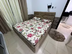 1BHK REsale in City Tower with an open view of Sharjah. Furnished and includes parking.