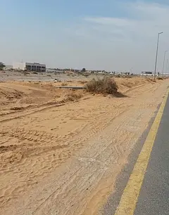 Two adjacent plots of land for sale in the Mazir'ah area, Al Rahmaniyah suburb.