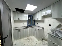 Two bedrooms and a living room for sale in the most prestigious location in Ajman with a wonderful v