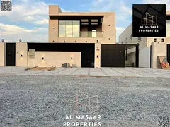 Luxury villa with a modern design, 5000 sq ft, with a garden, behind Ajman Academy. Price includes a