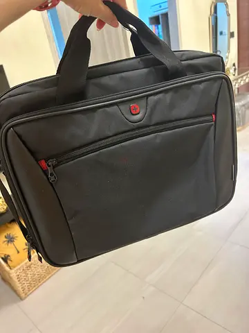 Sleek Black Laptop Bag - Perfect for Work or Travel. Brand-Wenger