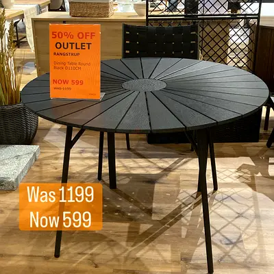 Circular Black Dining Table - Stylish and Practical