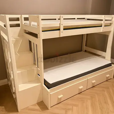Charming White Bunk Bed with Storage and Play Area