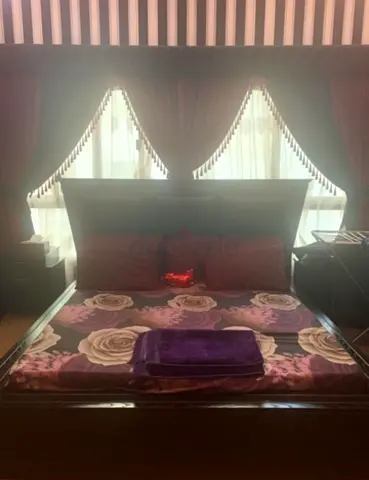 King size bed with dressing and side table