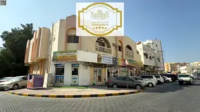 Corner Commercial Building for sale in Ajman Al Nuaimeya 1