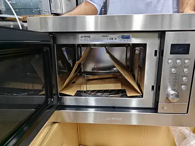 Smeg brand new microwave built in unused