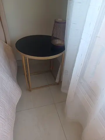 Elegant Gold and Black Side Tables