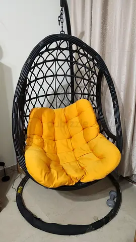 Cozy Hanging Egg Chair with Yellow Cushions