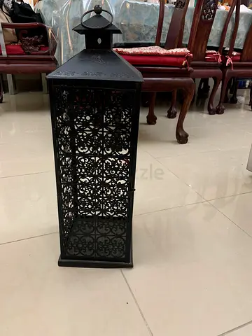 Elegant Metal Lantern With Intricate Design