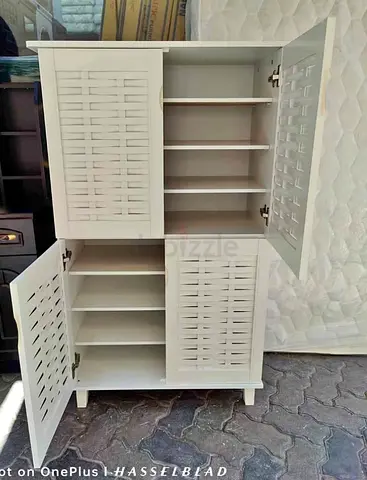 Sleek White Wooden Cabinet with Shelves