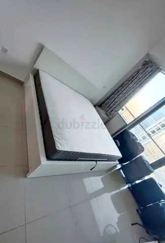 Ikea king size hydraulic bed with Ikea mattress