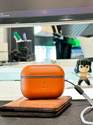 Air pods pro 2 charging case and Bellroy leather cover