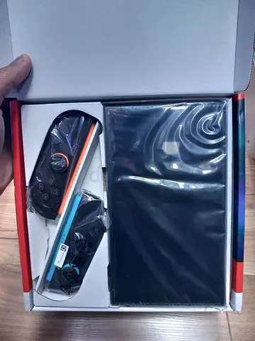 Nintendo Switch Console with Joy-Con Controllers