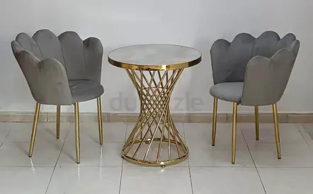 Elegant Grey Velvet Chairs with Modern Gold Table