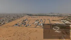For sale: residential land in Sharjah / Al DIbdibah south (Al Rahmaniya suburb ) With the possibilit