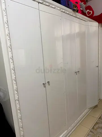 White Wardrobe with Decorative Edges