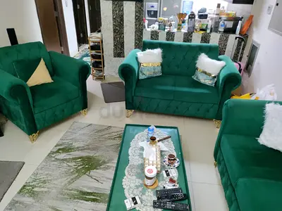 Elegant Green Velvet Sofa with Cozy Cushions