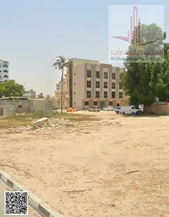 For sale in Ajman, in the Liwara 1 area: Residential investment land, ground floor + 2 floors, area