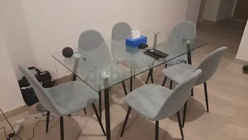 Modern Glass Dining Table with Stylish Chairs