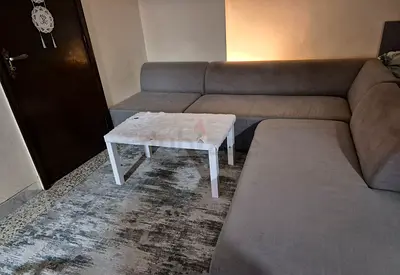 Spacious L-Shaped Sofa with Cozy Cushions