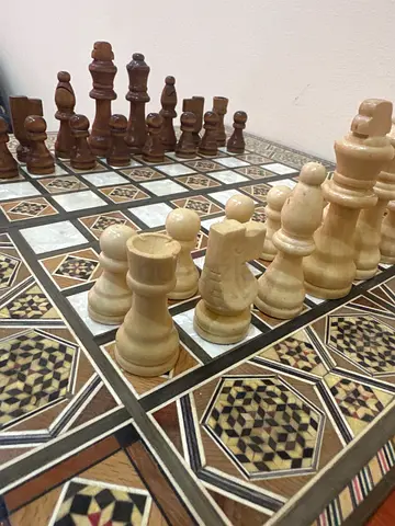 Elegant Vintage Chess Set with Intricate Board