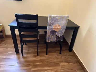 Black Dining Table with 6 Chairs and covers