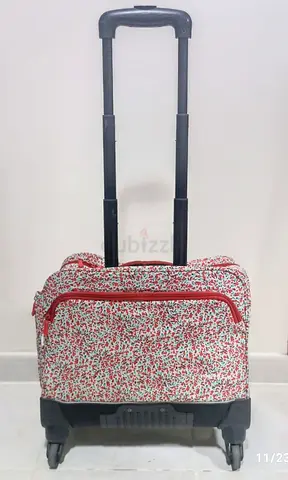 Wagon R - Red Floreal Laptop Bag Trolley - for school work and travel 160dhs last price
