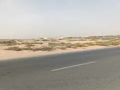 Land for sale in Al Sajaa area, 32,000 sq ft, prime location