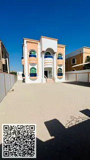 Villa for sale in Ajman, Al Rawda area, with water and electricity.