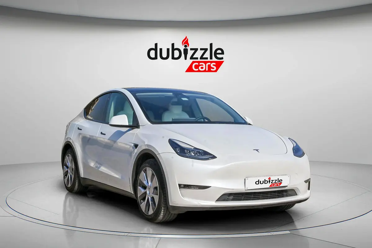 Tesla Model Y 2024 — photo 1 of 17