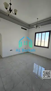 One-bedroom apartment with a living room for annual rent – behind Grand Mall Al Rashidiya 3