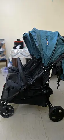 Double Trouble: Twin Stroller for Sale!
