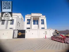 For sale in Al-Haliyo 2: Villa with 6 master bedrooms, a majlis, a corner living room, and central a