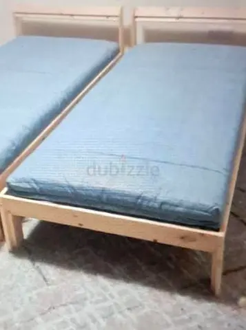 Ikea neiden pine bed frame with Ikea firm foam mattress