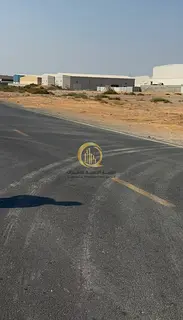 For sale: land in Al-Sajaa Industrial, specifically in Emirates Industrial City, Block 8, with an ar